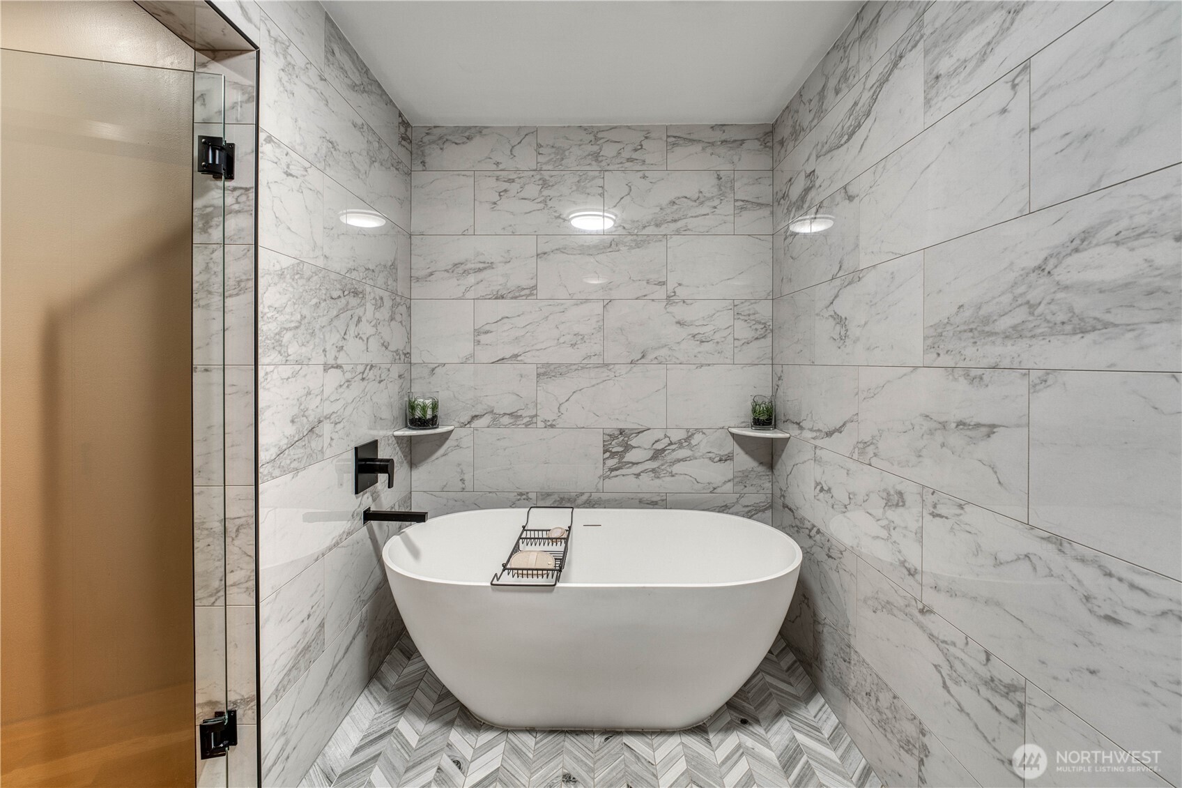 507 North 3rd Street, Unit 101 Tacoma, WA 98403 - Photo 24 of 33 a bathroom with a bathtub and shower