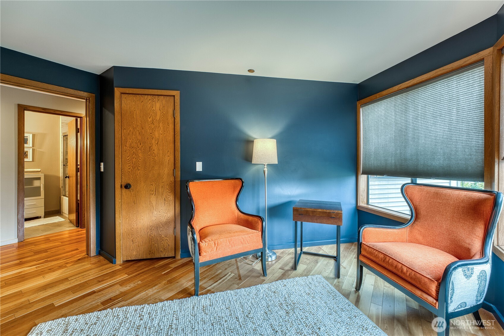 507 North 3rd Street, Unit 101 Tacoma, WA 98403 - Photo 32 of 33 a living room with furniture and a lamp