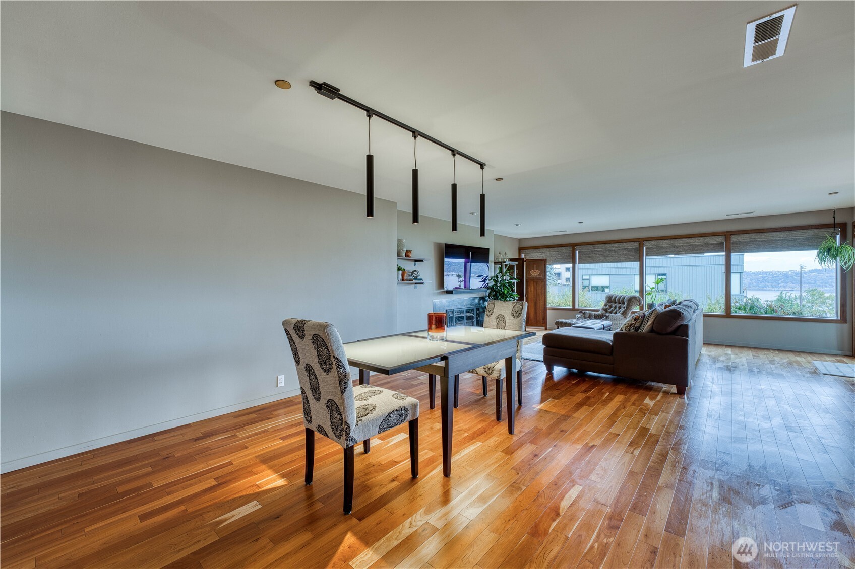 507 North 3rd Street, Unit 101 Tacoma, WA 98403 - Photo 4 of 33 a living room with furniture and a wooden floor