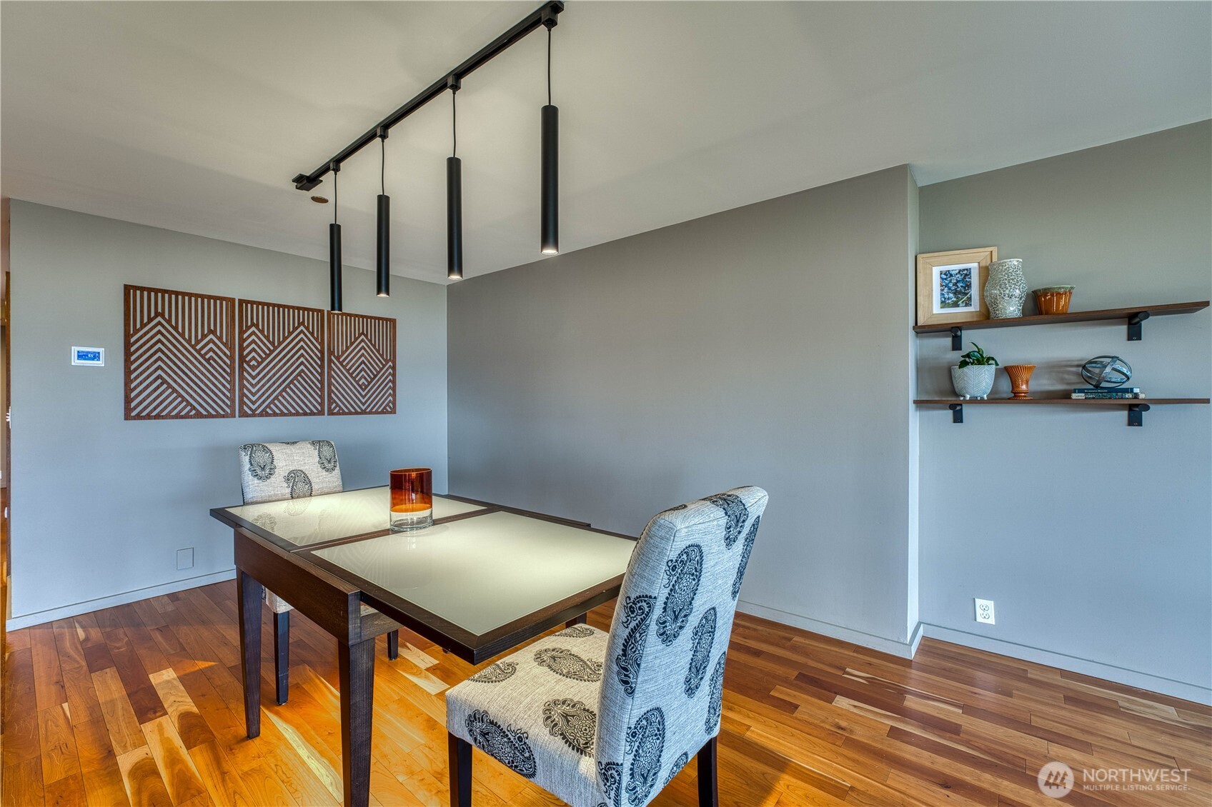 507 North 3rd Street, Unit 101 Tacoma, WA 98403 - Photo 5 of 33 a view of a dining room with furniture and wooden floor