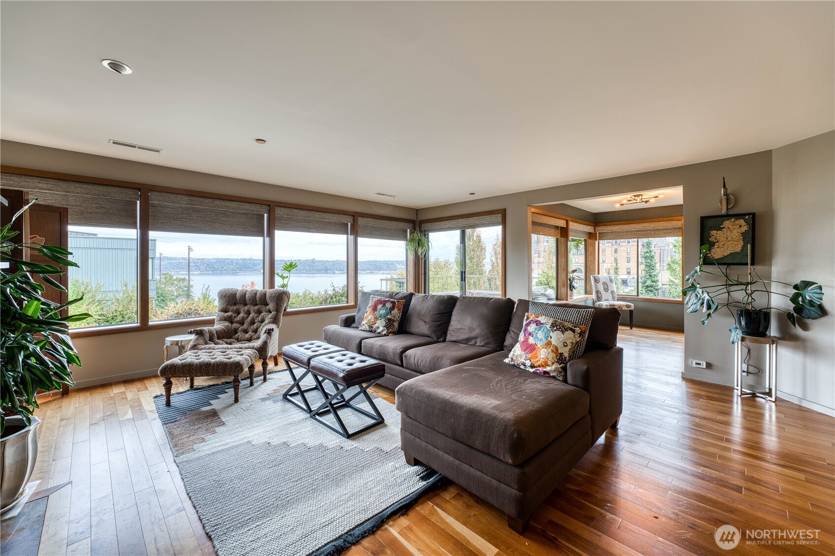 507 North 3rd Street, Unit 101 Tacoma, WA 98403 - Photo 7 of 33 a living room with furniture and floor to ceiling windows