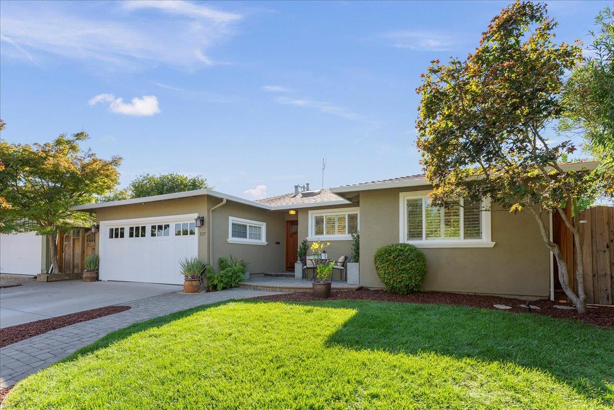 237 Barbara Drive Los Gatos, CA 95032 - Photo 3 of 9 a view of a house with backyard and a tree