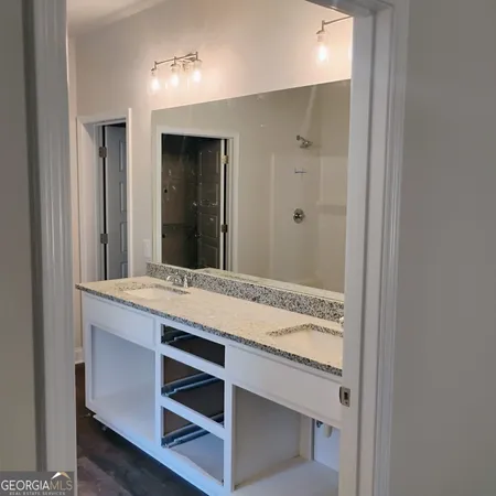 a view of an empty walk in closet