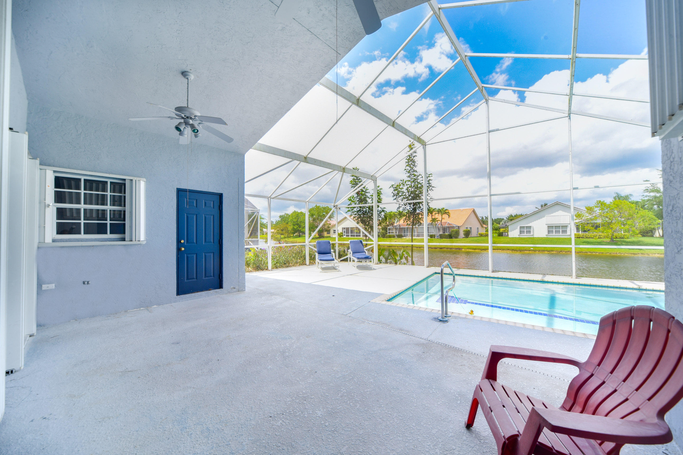 172 Cove Road Greenacres, FL 33413 - Photo 26 of 39 COVE POOL PATIO LAKE VIEW