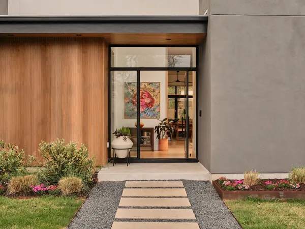 a reading room with furniture and rug