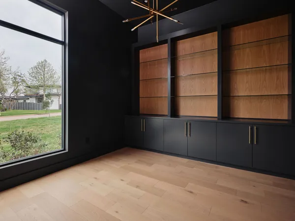 a bathroom with a double vanity sink mirror and shower