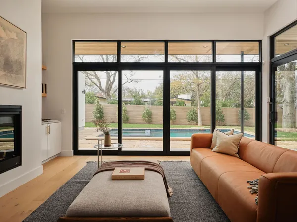 a kitchen with granite countertop a stove and cabinets