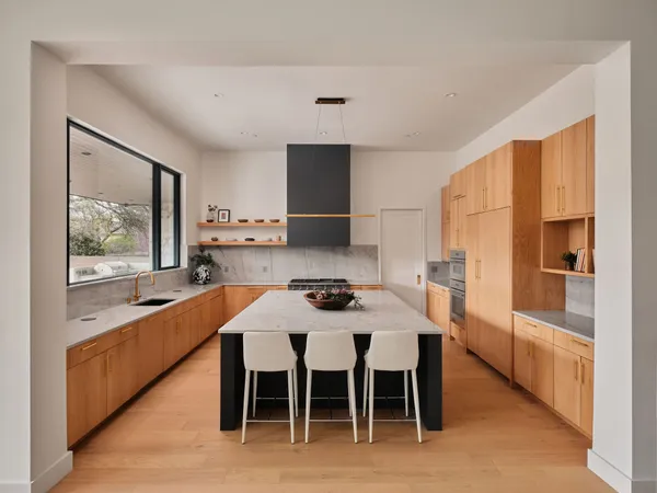a utility room with sink dryer and washer
