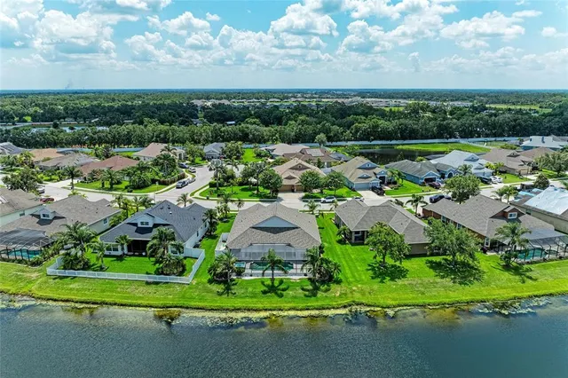 an aerial view of a house with a garden