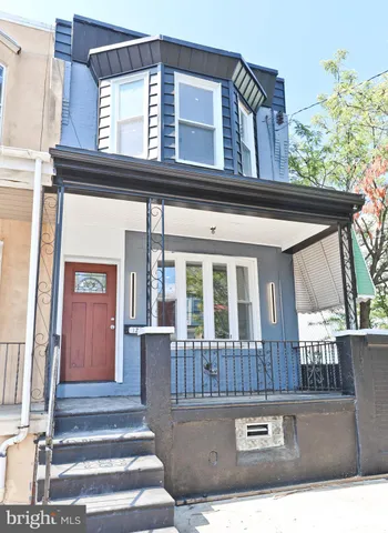 a spacious bathroom with a bathtub and a shower