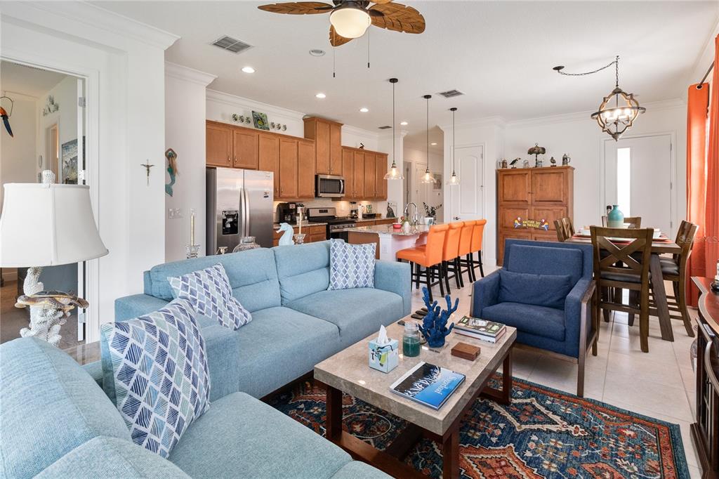 2557 Yellow Brick Road St. Cloud, FL 34772 - Photo 13 of 41 a living room with furniture and kitchen view