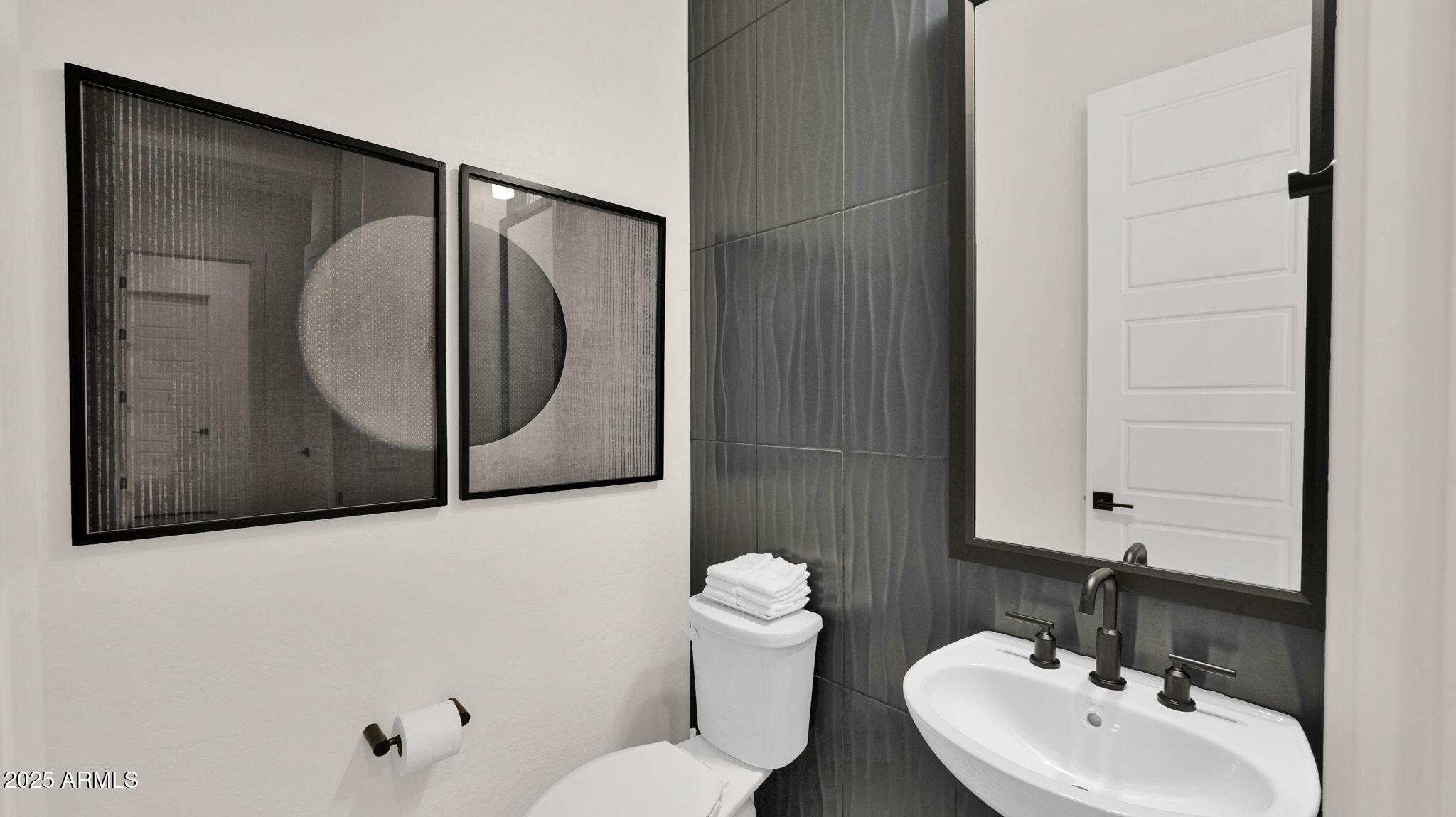38500 North School House Road, Unit 8 Cave Creek, AZ 85331 - Photo 11 of 35 a bathroom with a toilet sink and mirror