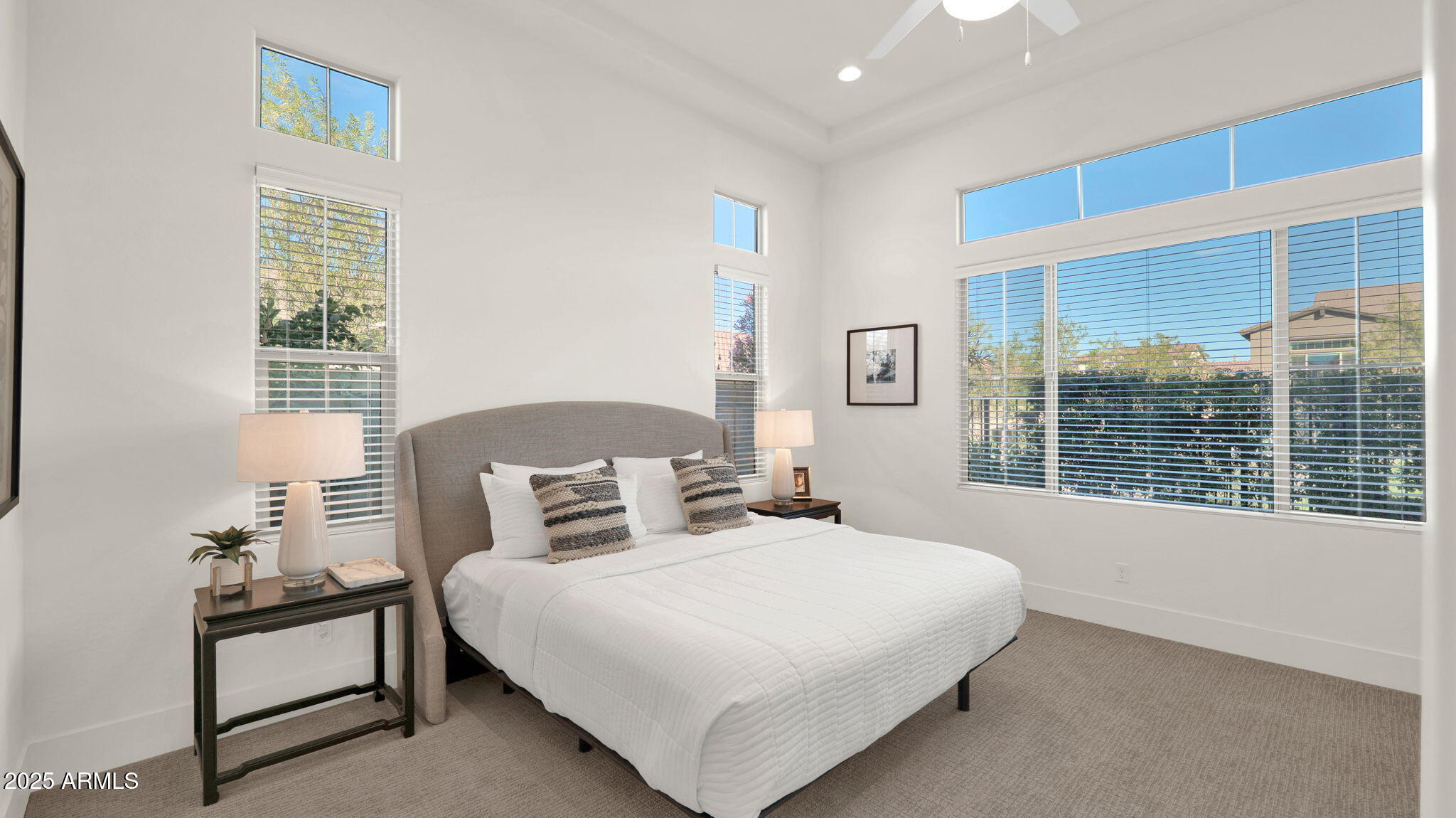 38500 North School House Road, Unit 8 Cave Creek, AZ 85331 - Photo 13 of 35 a bedroom with a large bed and a window
