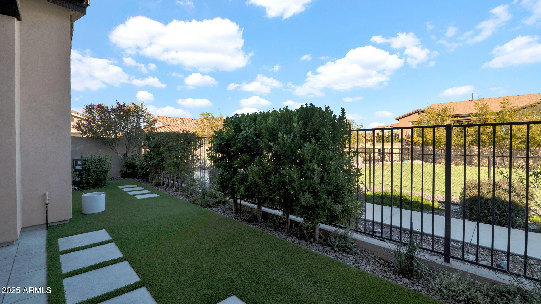 38500 North School House Road, Unit 8 Cave Creek, AZ 85331 - Photo 25 of 35 a view of a backyard with garden