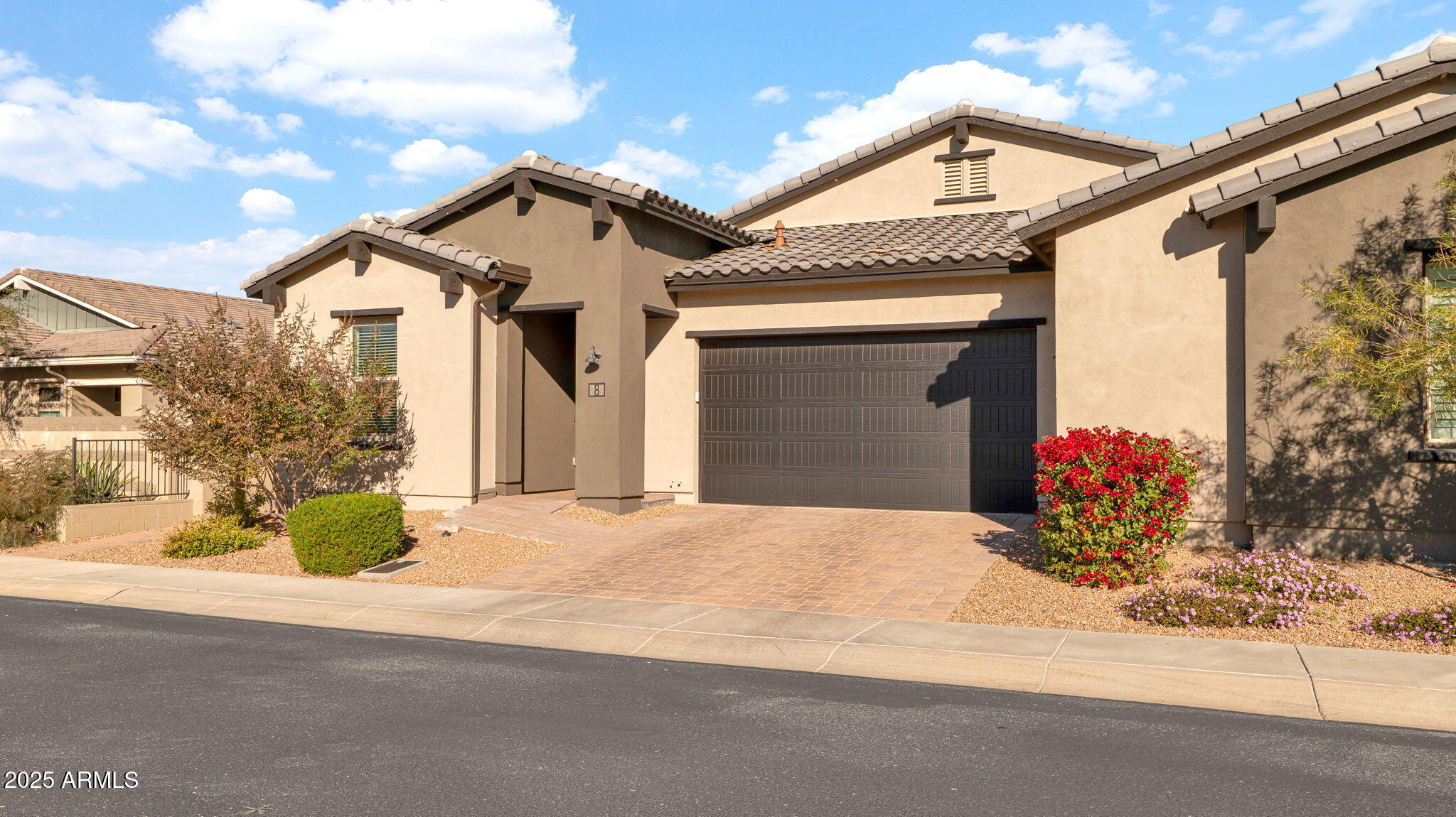 38500 North School House Road, Unit 8 Cave Creek, AZ 85331 - Photo 31 of 35 a front view of a house with shower