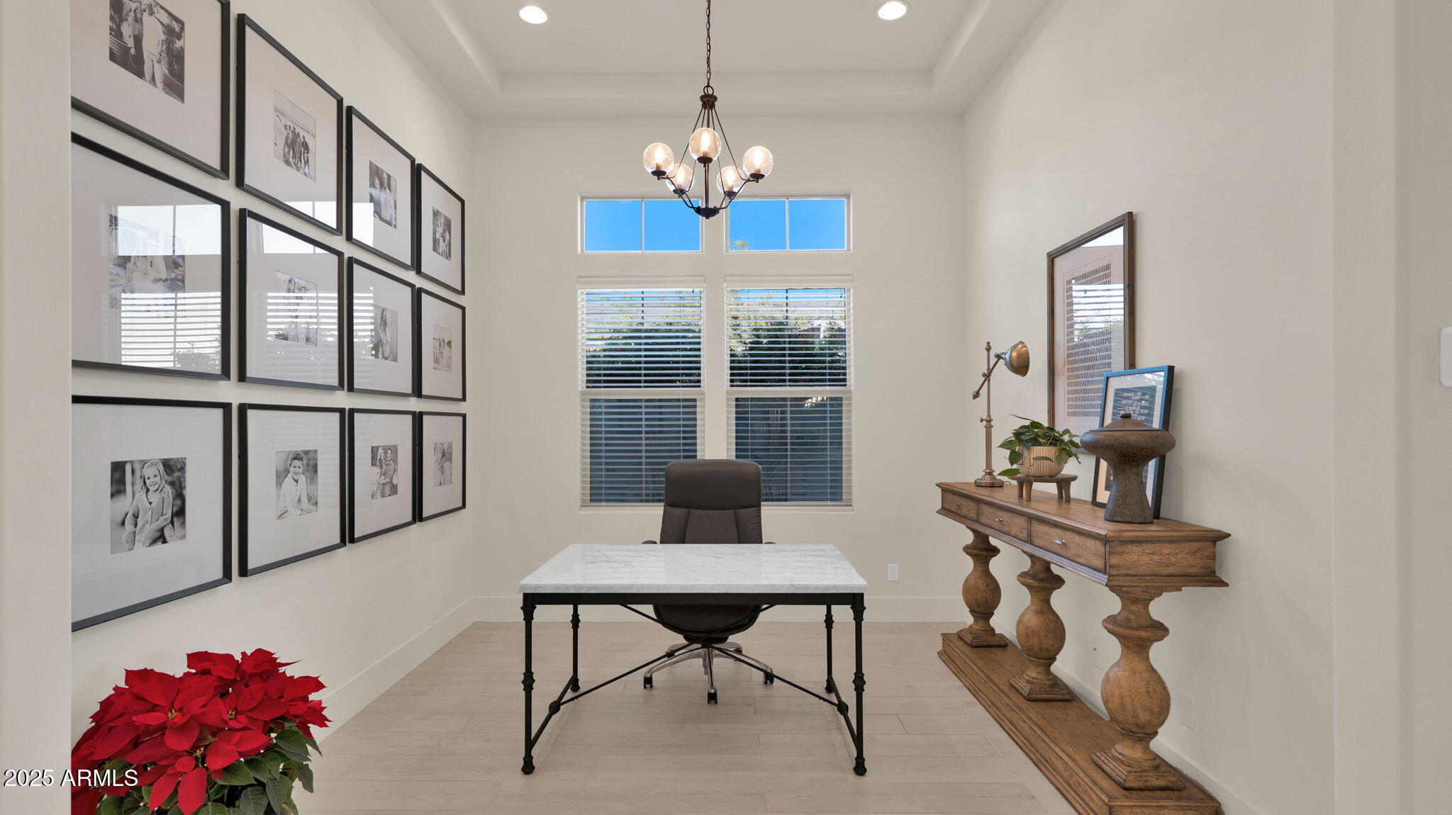 38500 North School House Road, Unit 8 Cave Creek, AZ 85331 - Photo 8 of 35 a living room with furniture and a chandelier