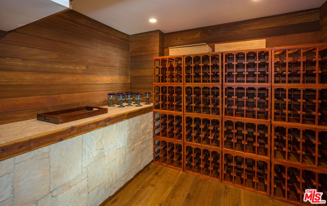 24408 Malibu Road Malibu, CA 90265 - Photo 41 of 44 a kitchen with a sink and a stove