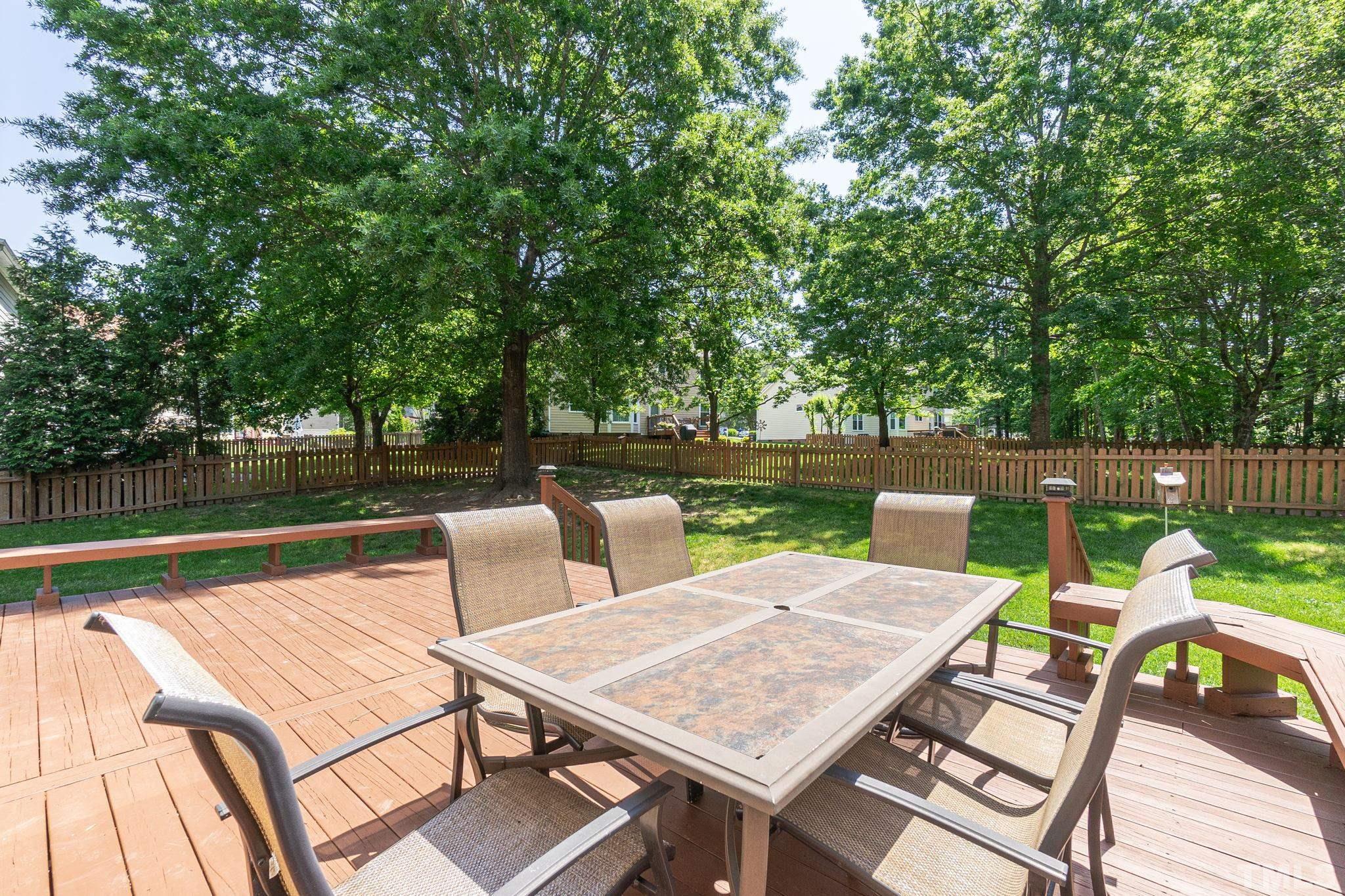 5717 Raddington Street Raleigh, NC 27613 - Photo 57 of 58 a view of a patio with wooden floor