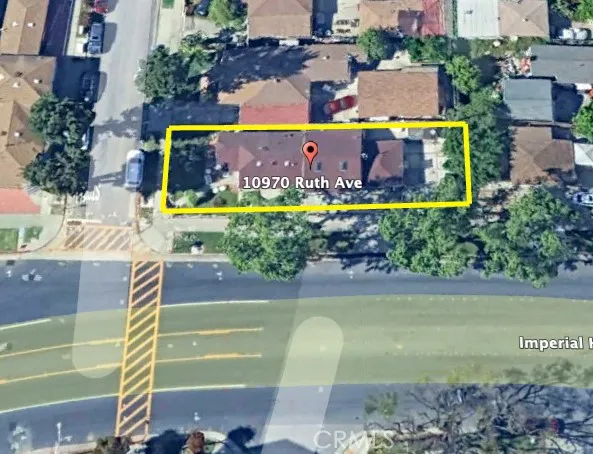 a view of a swimming pool with a yard