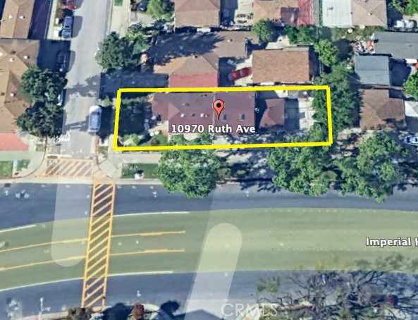 10970 Ruth Avenue Lynwood, CA 90262 - Photo 2 of 27 a view of a swimming pool with a yard