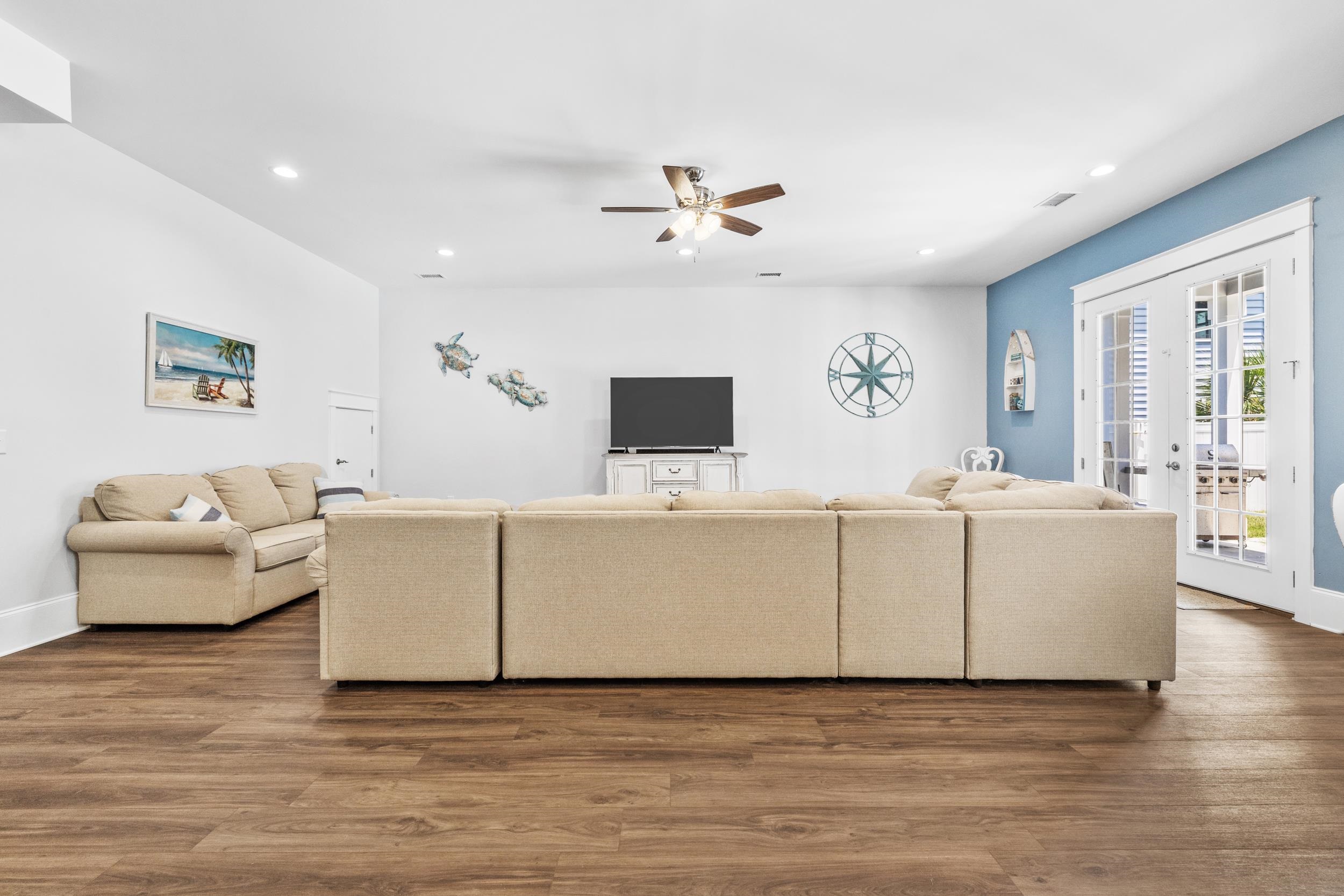 5907 Haskell Circle Myrtle Beach, SC 29577 - Photo 11 of 38 Living room featuring wood finished floors, french doors, recessed lighting, and a ceiling fan
