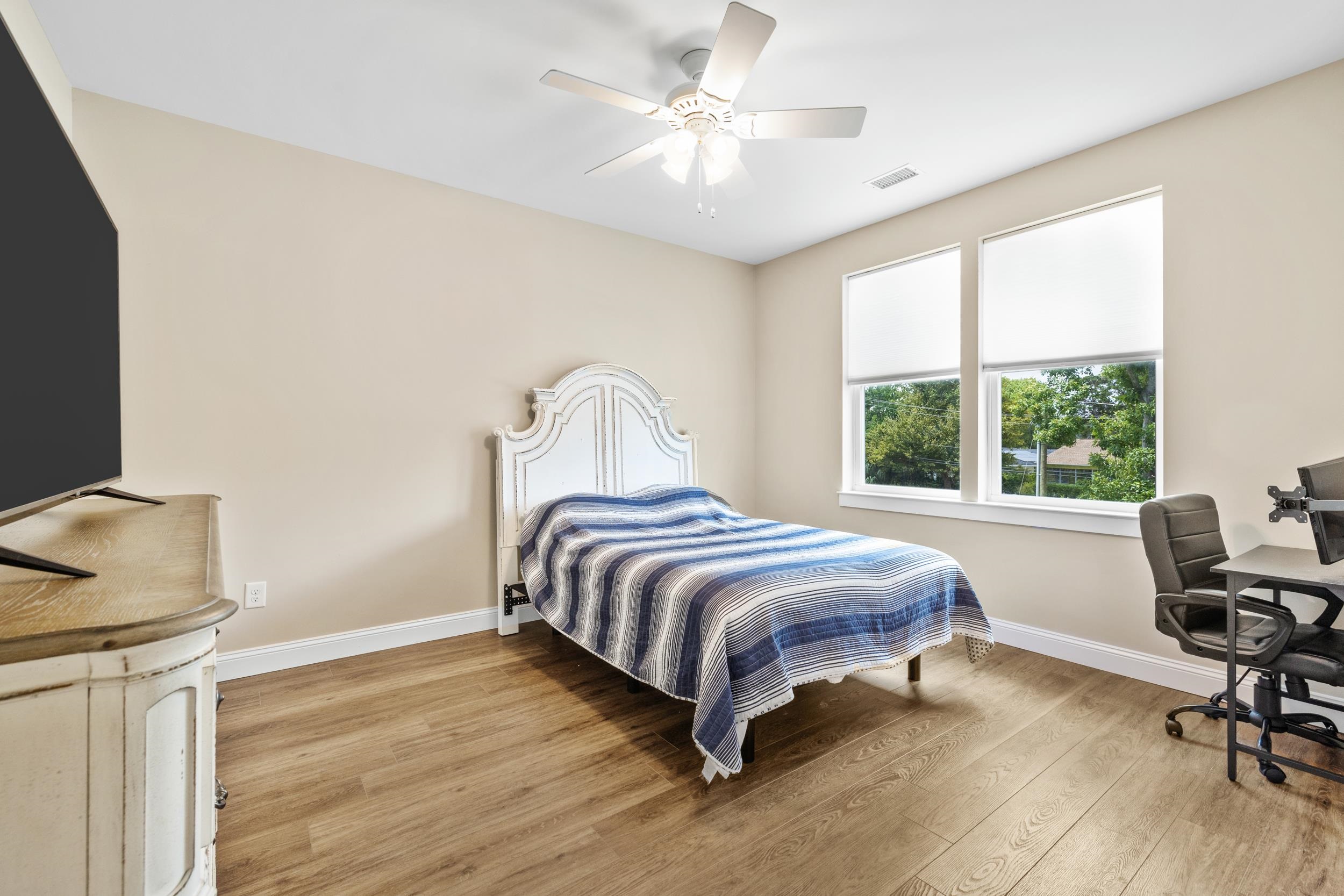 5907 Haskell Circle Myrtle Beach, SC 29577 - Photo 27 of 38 Bedroom featuring a desk, ceiling fan, and light wood finished floors