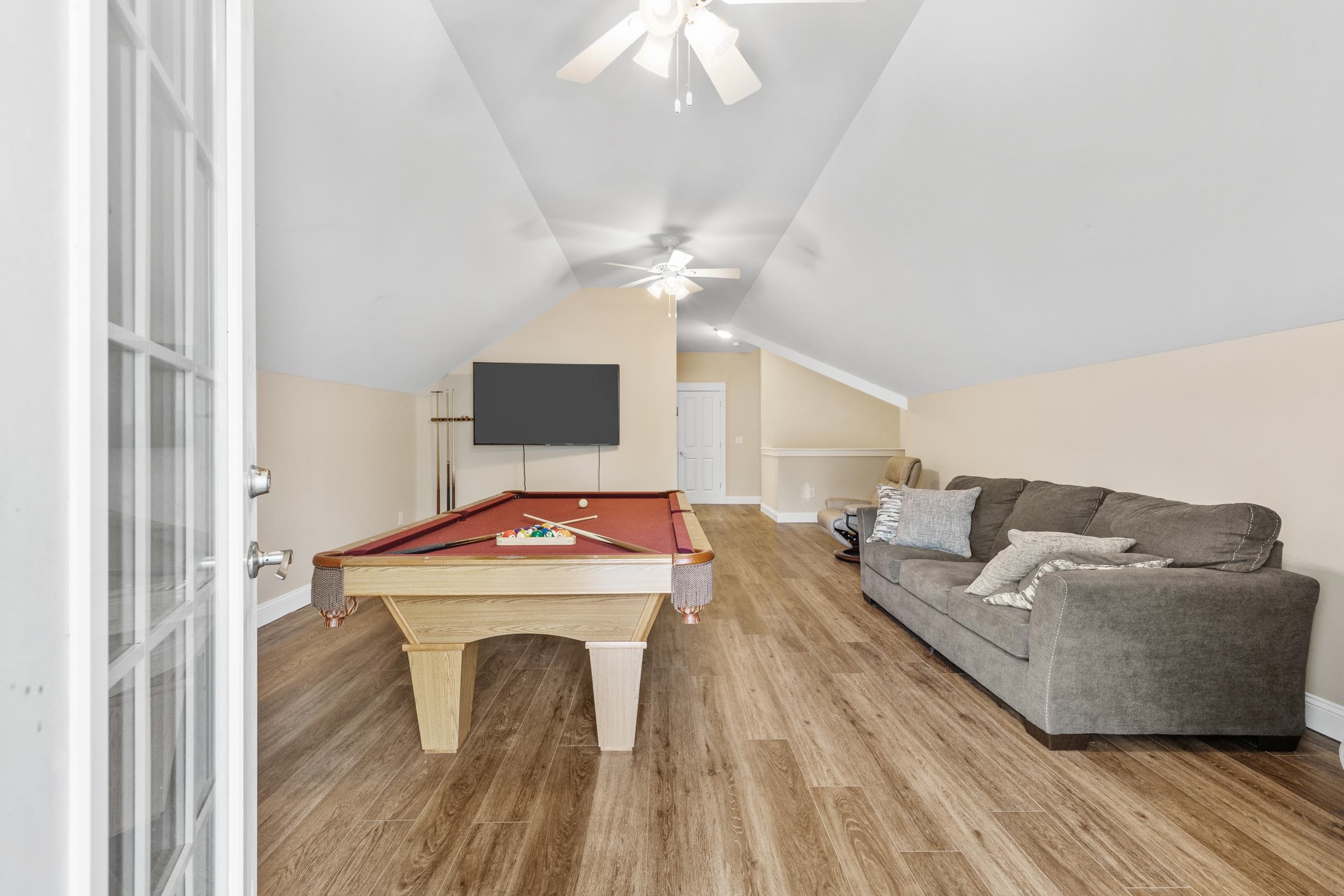 5907 Haskell Circle Myrtle Beach, SC 29577 - Photo 31 of 38 Recreation room featuring billiards table, light wood-type flooring, vaulted ceiling, and a ceiling fan