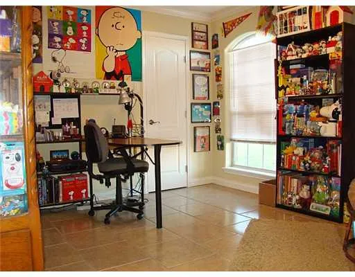 a view of gym equipment and children play room
