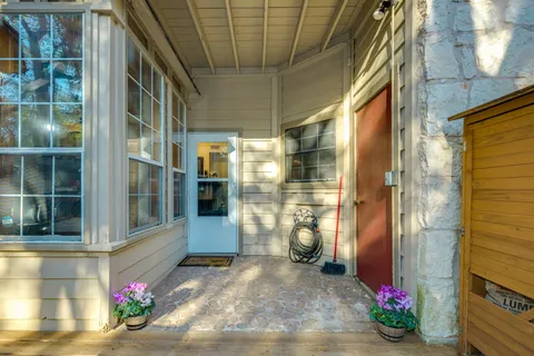 a view of a patio with a yard