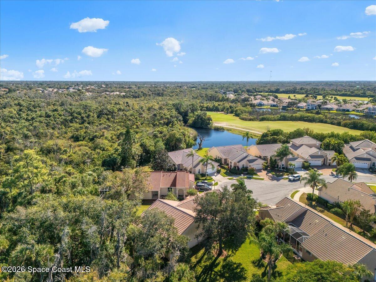 8200 Simpkins Way Melbourne, FL 32940 - Photo 13 of 49 an aerial view of ocean and residential houses with outdoor space