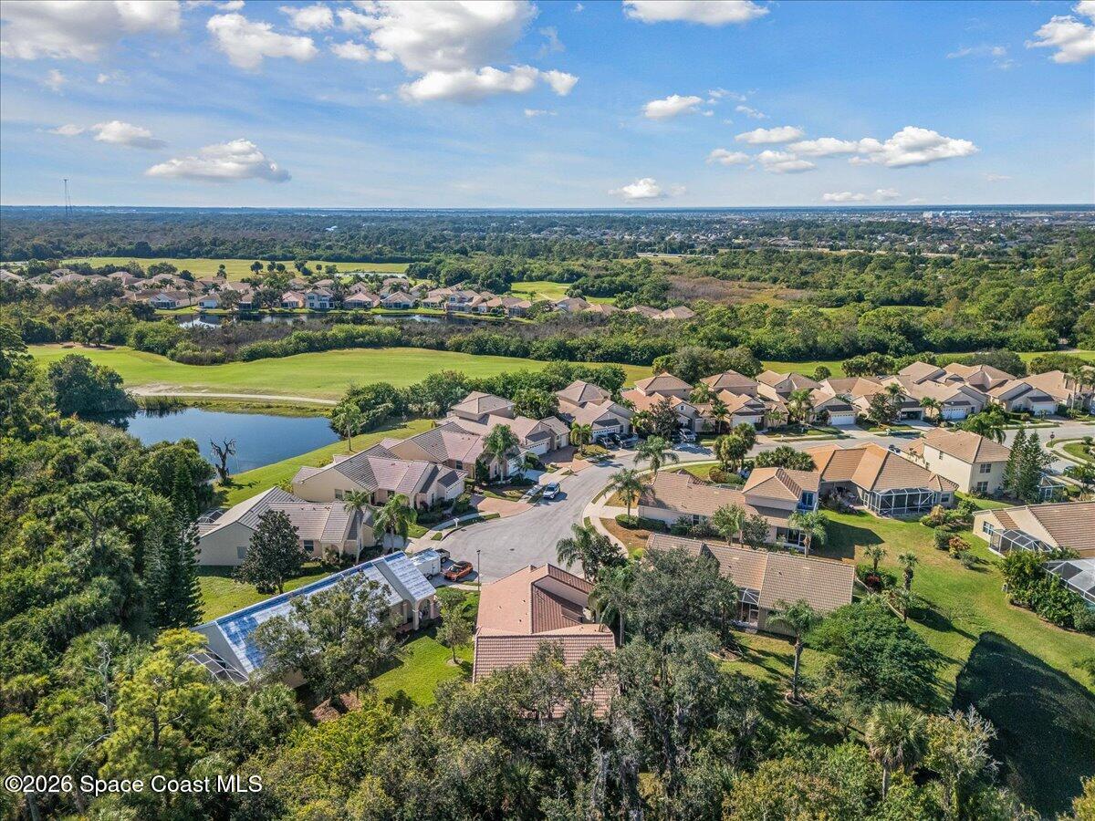 8200 Simpkins Way Melbourne, FL 32940 - Photo 22 of 49 an aerial view of residential building and lake