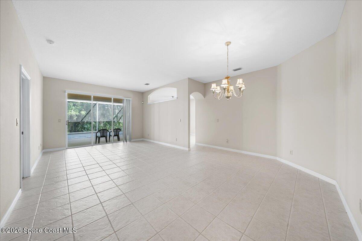 8200 Simpkins Way Melbourne, FL 32940 - Photo 26 of 49 a view of an empty room with a window