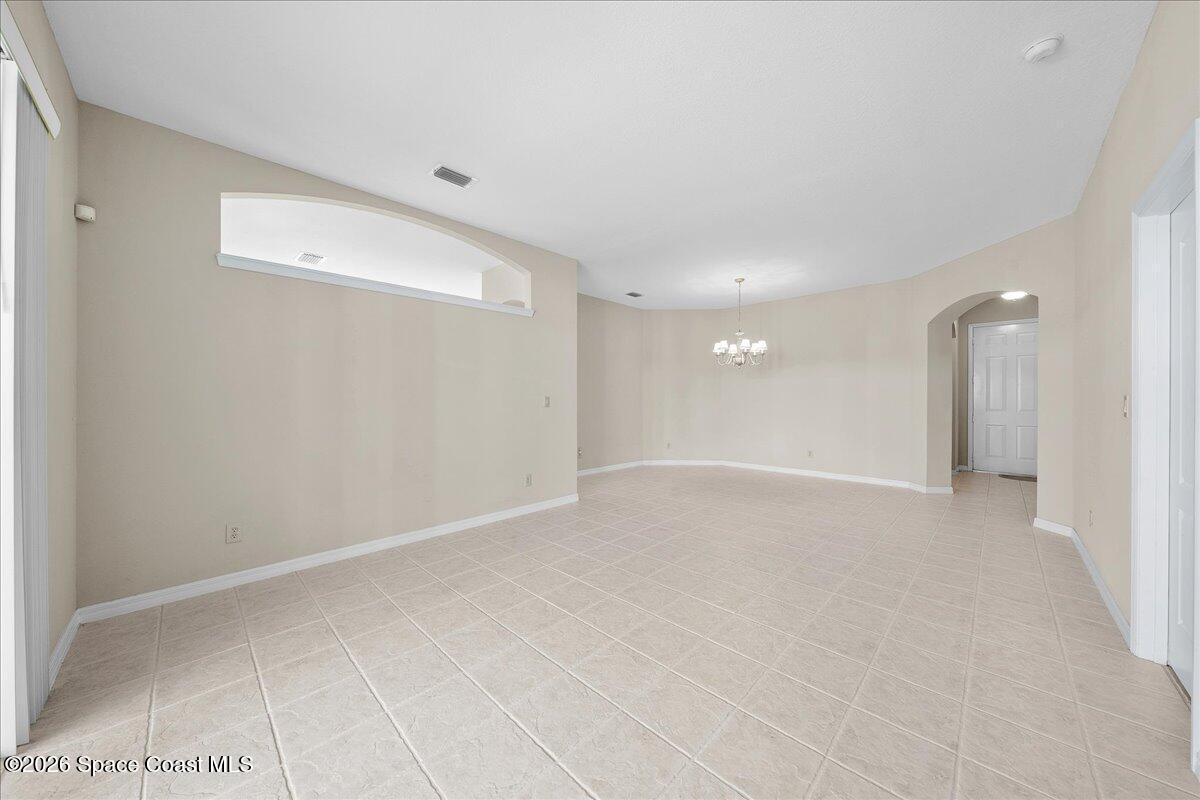 8200 Simpkins Way Melbourne, FL 32940 - Photo 27 of 49 a view of an empty room