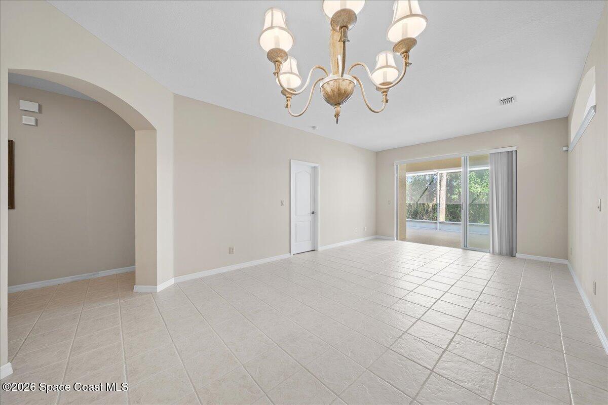 8200 Simpkins Way Melbourne, FL 32940 - Photo 28 of 49 a view of an empty room with a window
