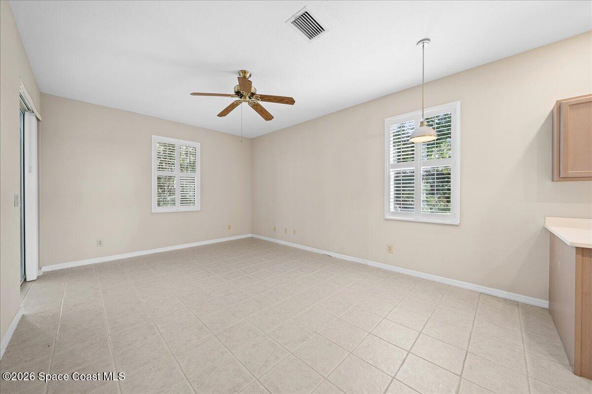 8200 Simpkins Way Melbourne, FL 32940 - Photo 30 of 49 a view of an empty room with a window