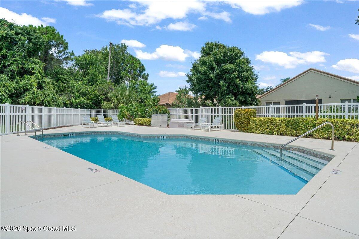 8200 Simpkins Way Melbourne, FL 32940 - Photo 46 of 49 a view of a swimming pool with a patio