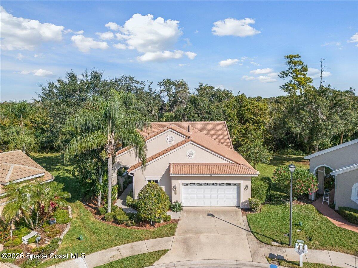 8200 Simpkins Way Melbourne, FL 32940 - Photo 6 of 49 an aerial view of a house