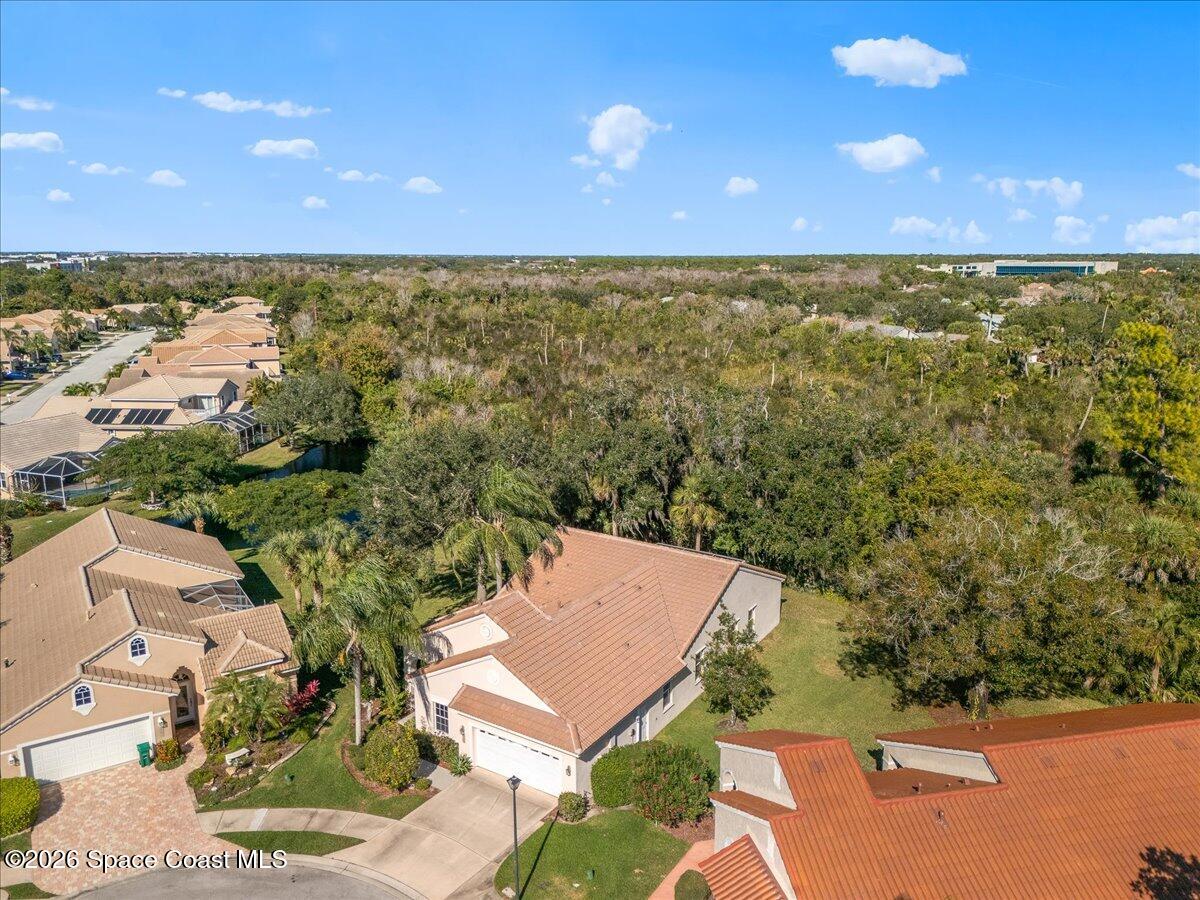 8200 Simpkins Way Melbourne, FL 32940 - Photo 10 of 49 an aerial view of multiple house