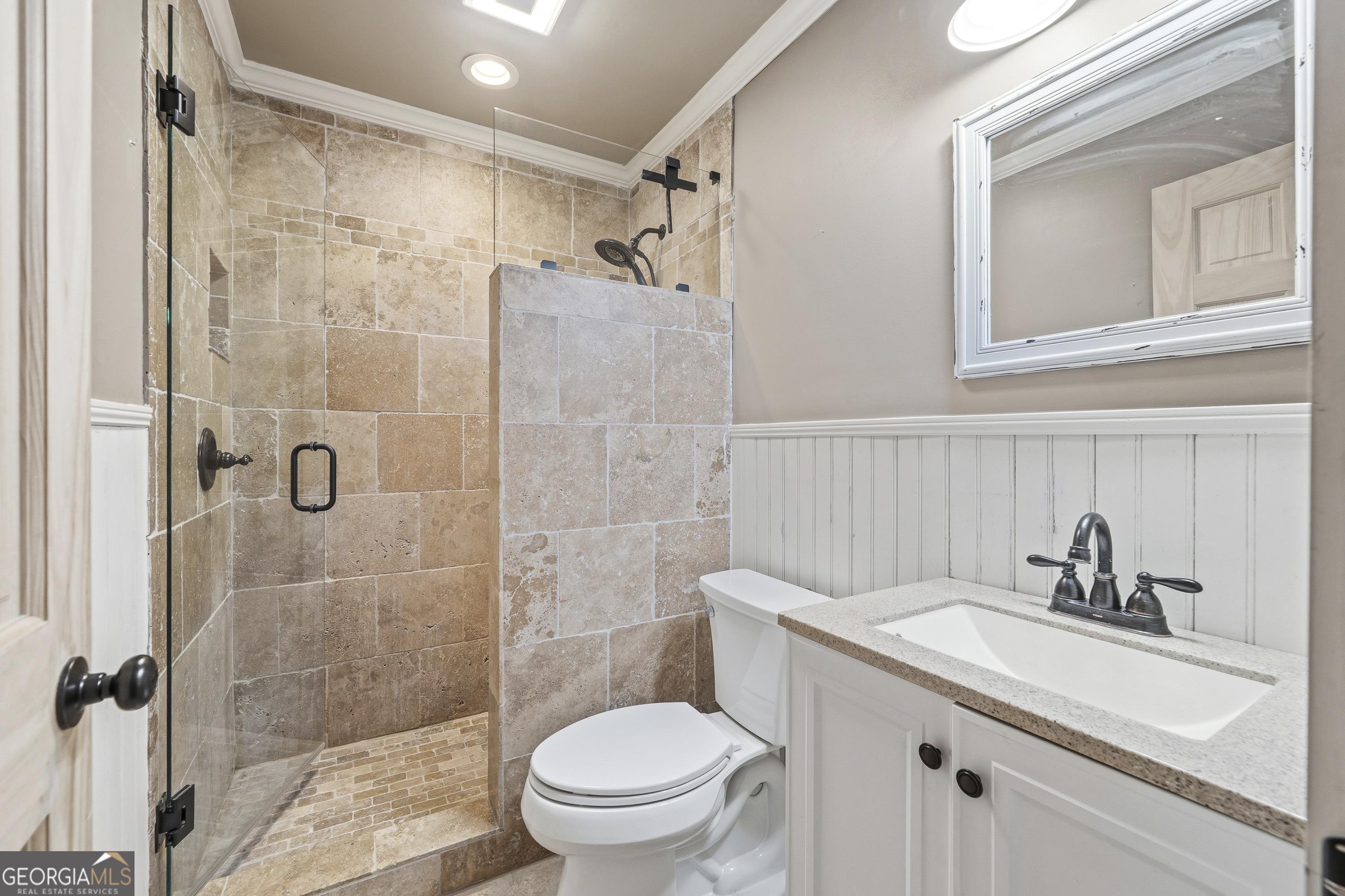 63 Tomahawk Drive Sparta, GA 31087 - Photo 37 of 60 a bathroom with a sink toilet and shower