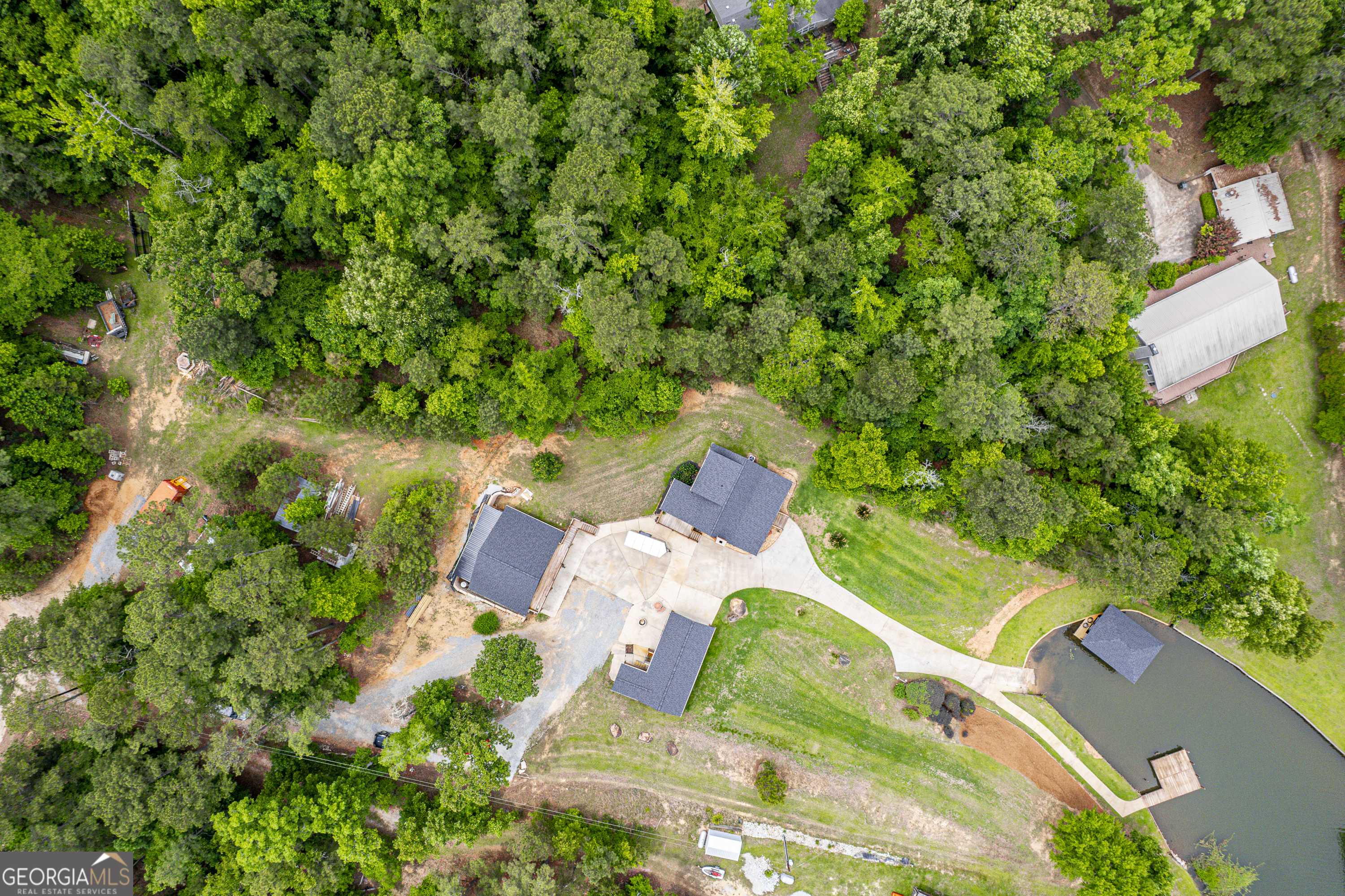 63 Tomahawk Drive Sparta, GA 31087 - Photo 43 of 60 an aerial view of a house with a yard and trees