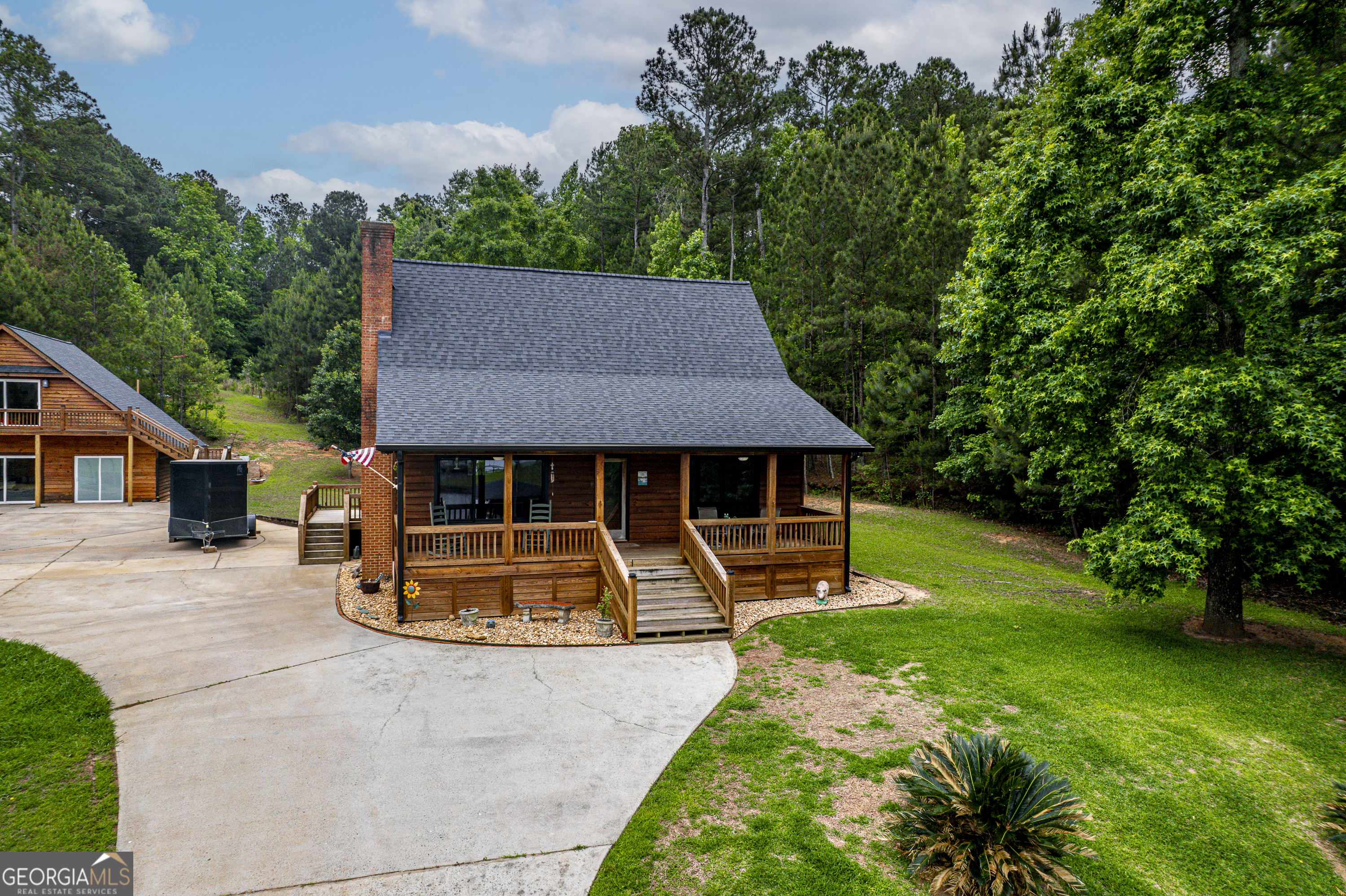 63 Tomahawk Drive Sparta, GA 31087 - Photo 46 of 60 front view of a house with a yard