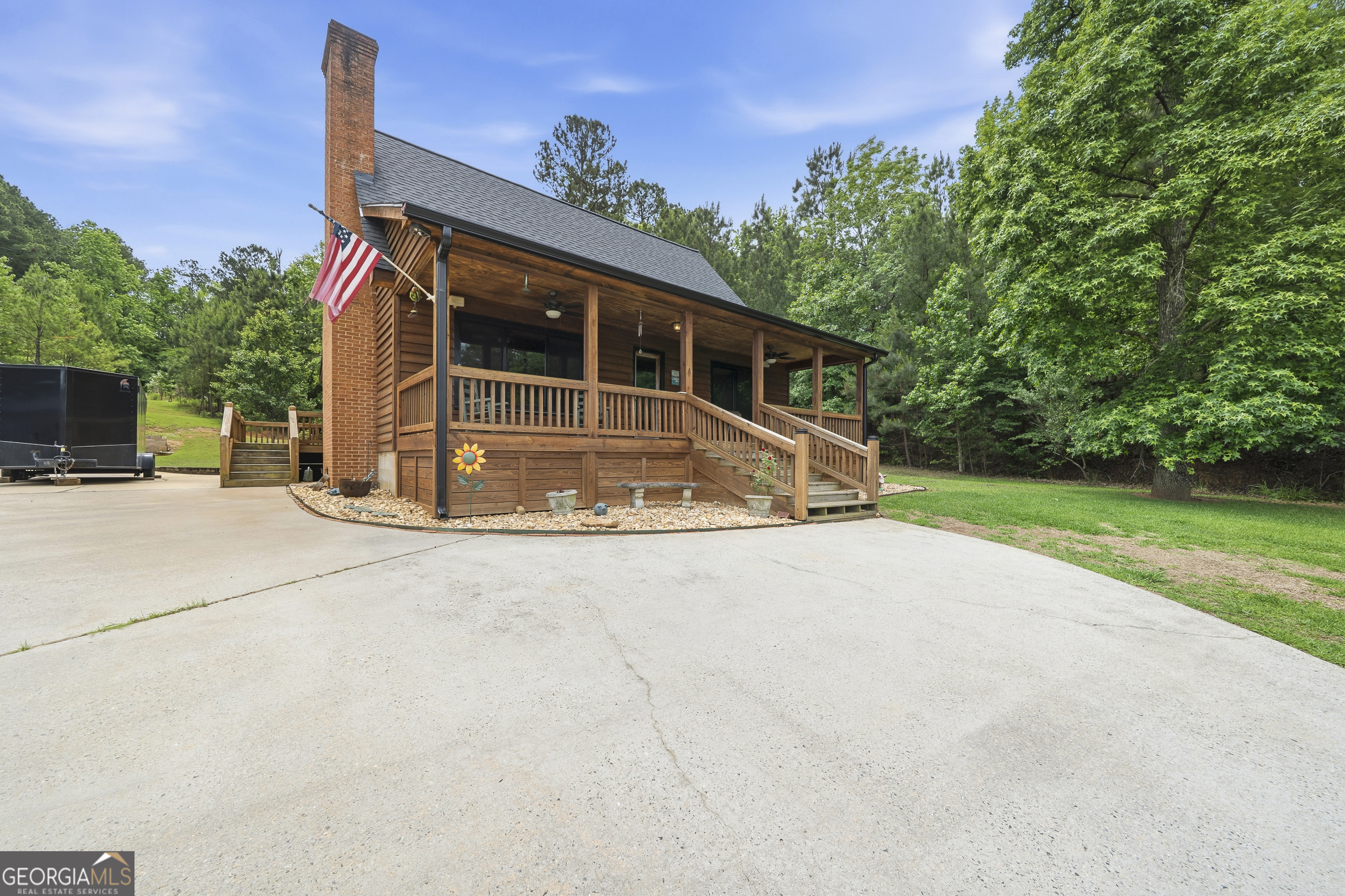 63 Tomahawk Drive Sparta, GA 31087 - Photo 60 of 60 a house with trees in the background