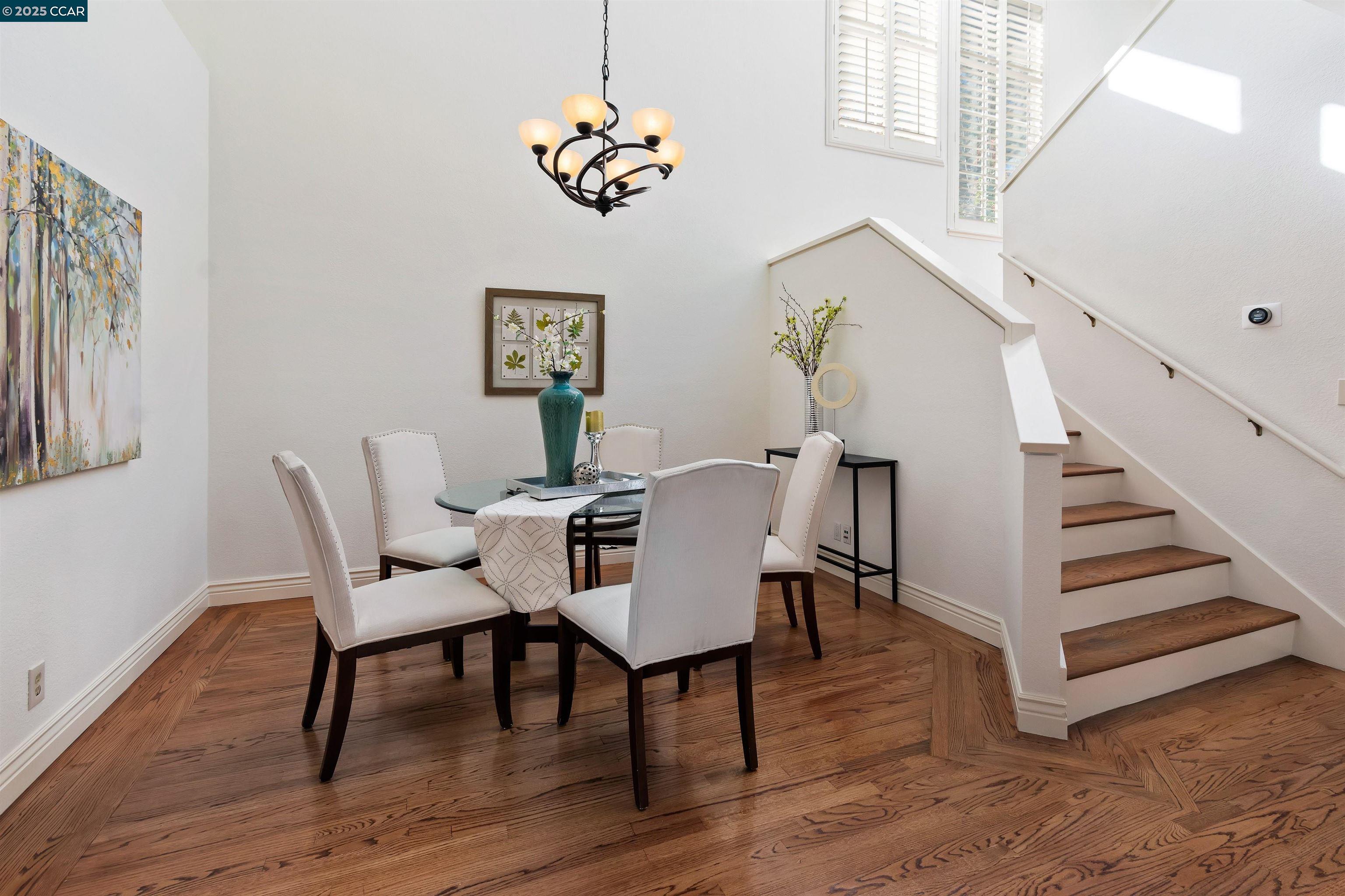 226 Lakeridge Way San Ramon, CA 94582 - Photo 12 of 59 a view of a dining room with furniture wooden floor and a chandelier
