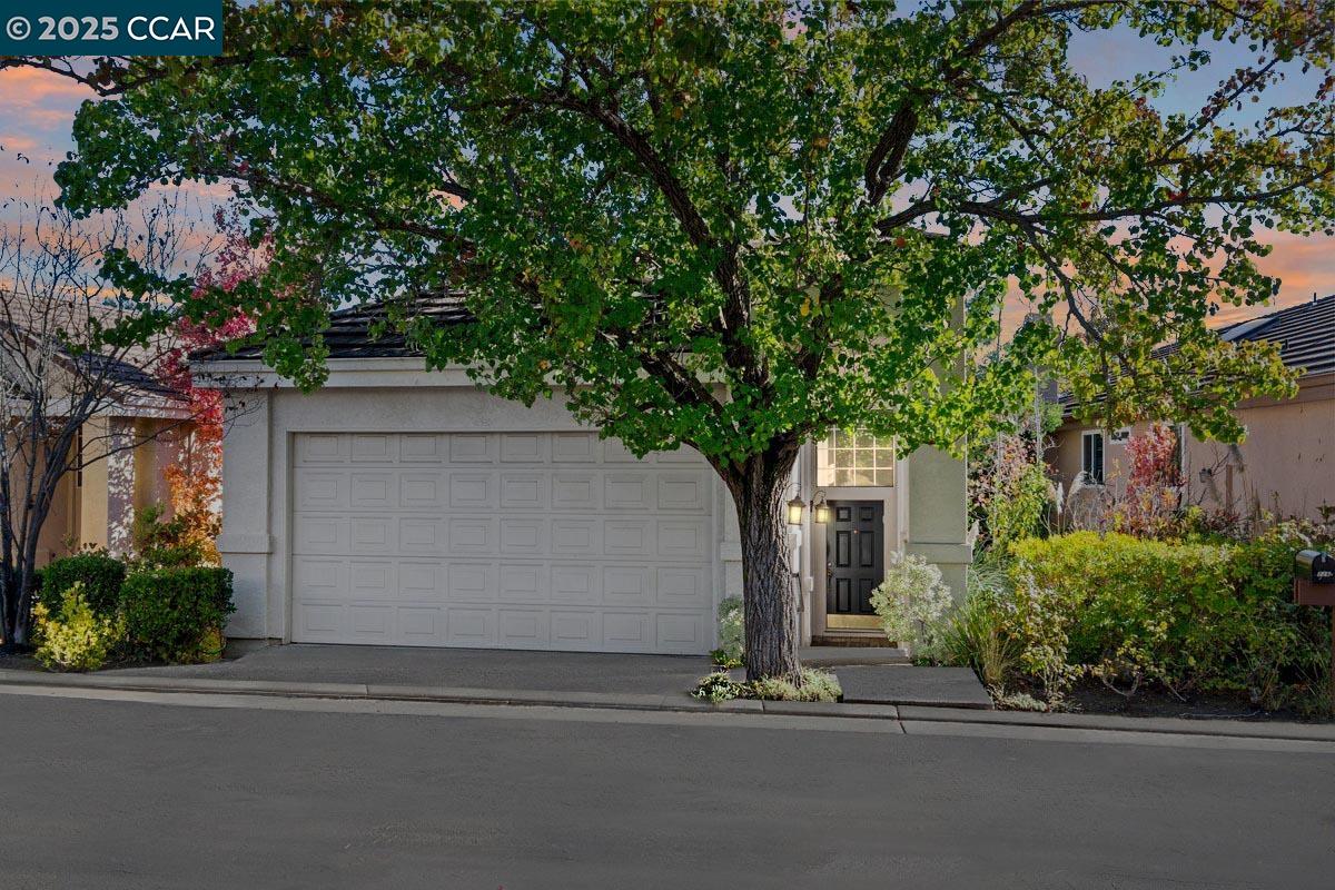 226 Lakeridge Way San Ramon, CA 94582 - Photo 2 of 59 a front view of a house with a yard and garage