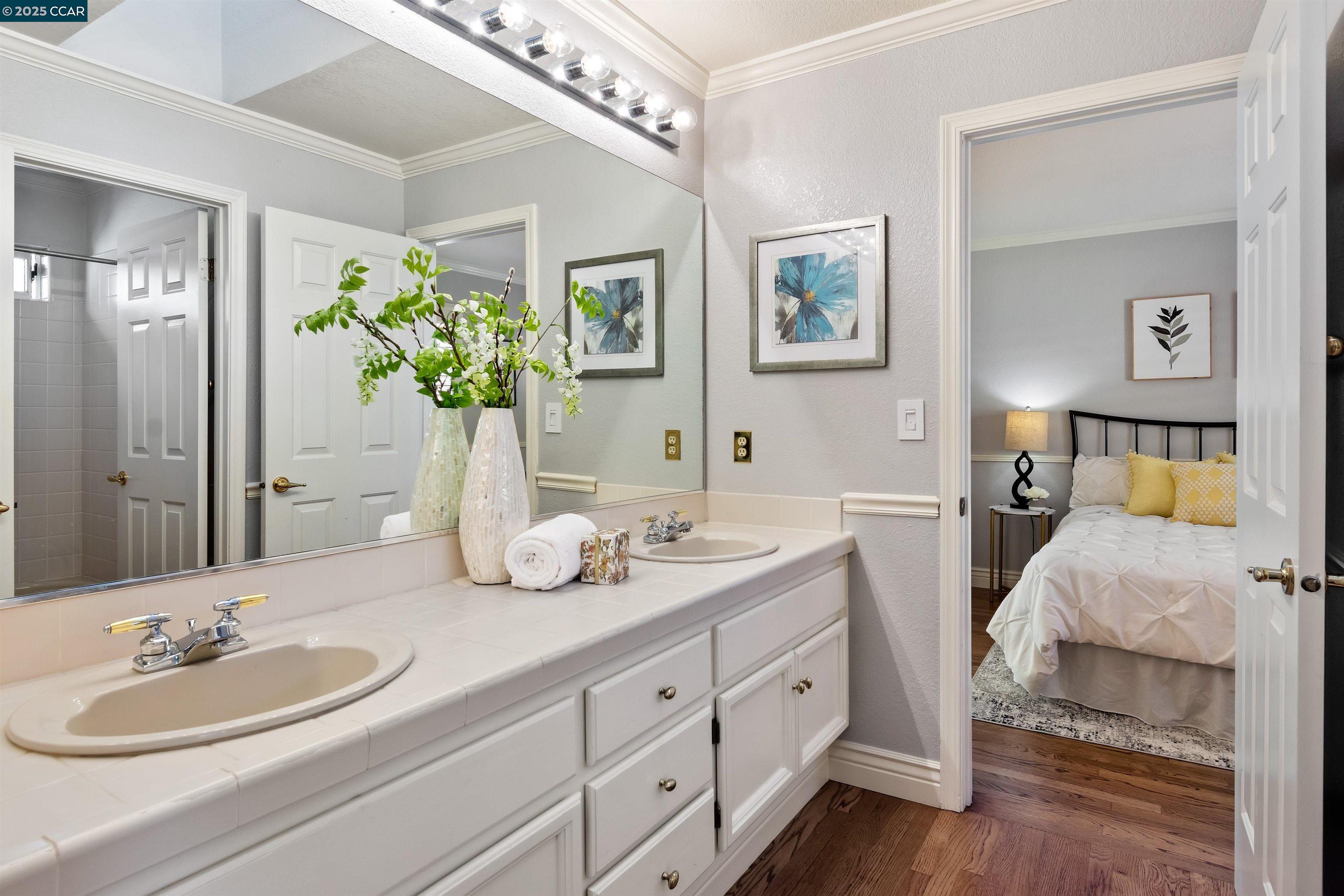 226 Lakeridge Way San Ramon, CA 94582 - Photo 35 of 59 a spacious en suite bathroom with double vanity sinks and a mirror