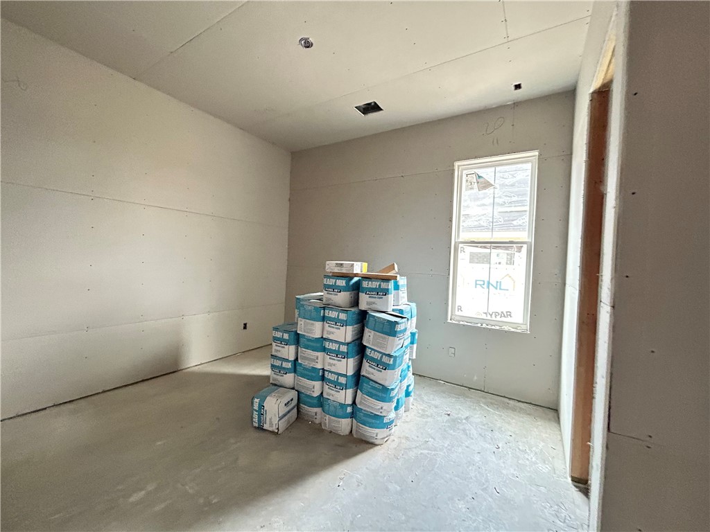 7028 Skipping Rock Path Bryan, TX 77808 - Photo 12 of 18 an empty room with windows