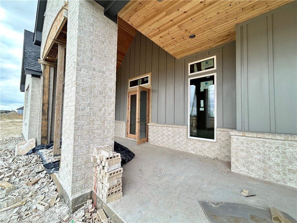 7028 Skipping Rock Path Bryan, TX 77808 - Photo 15 of 18 a entryway with furniture