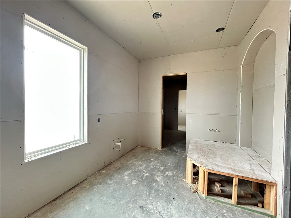 7028 Skipping Rock Path Bryan, TX 77808 - Photo 7 of 18 a living room with furniture and a fireplace