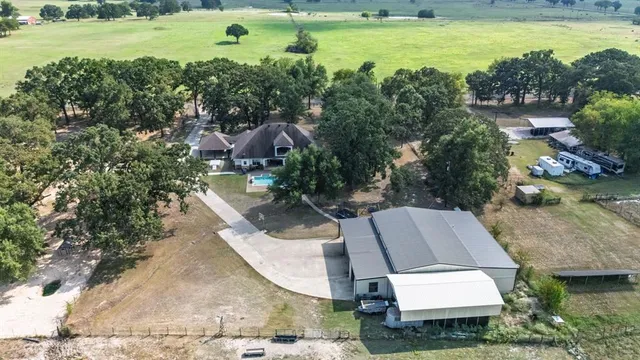 a view of an ocean with city and mountain view