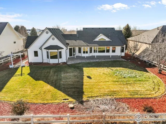 a view of a house with swimming pool